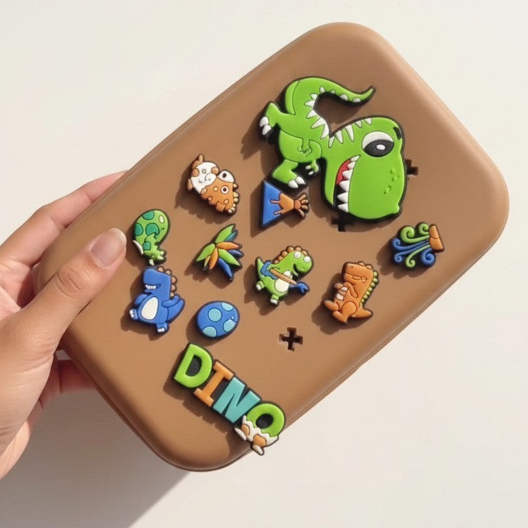 Brown pouch with colorful dinosaur designs on a light background