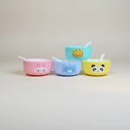 Mango Muffins set of 4 colorful cartoon animal snack bowls with spoons: pink bunny, blue bear, yellow panda, teal giraffe.