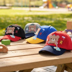 Mango Muffins red and navy cotton baseball cap with a 3D bear charm and "Love You" detail.