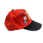 Mango Muffins red cotton cap with black brim, featuring a 3D bear charm and "Have a happy day" embroidery.