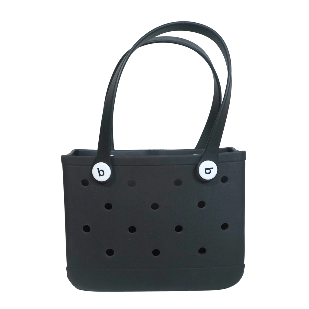 Mango Muffins black waterproof PVC tote bag with white logo buttons and perforated sides.