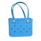Mango Muffins bright blue waterproof PVC tote bag with polka dot cutouts and white logo buttons.