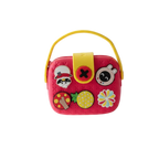 Mango Muffins Signature Series Charmer Sling crossbody bag for kids, red EVA with yellow snap closure and fun charms.
