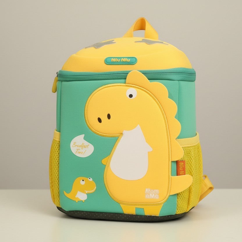 Mango Muffins yellow and teal dragon backpack with 3D wings and textured scales. Features adjustable straps and mesh side pockets.