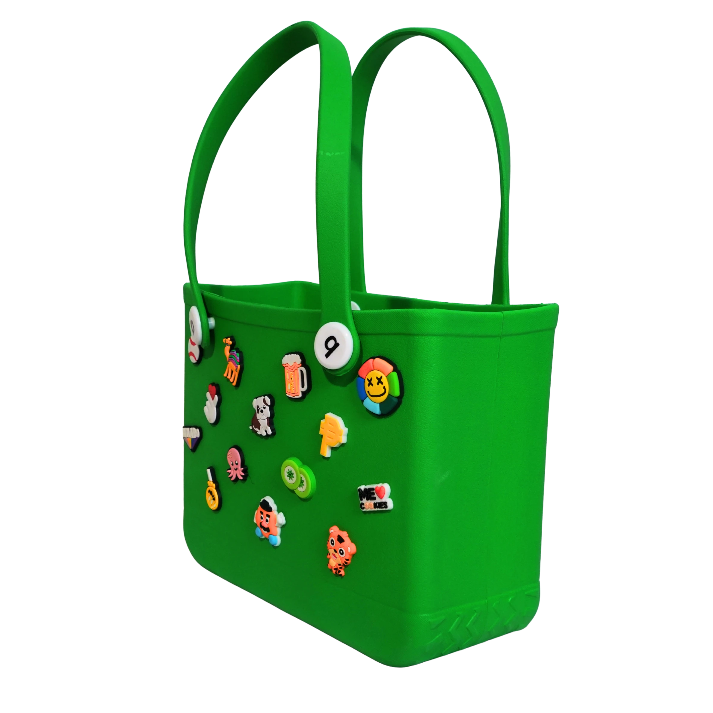 Mango Muffins bright green waterproof PVC tote bag with colorful Jibbitz-style charms and soft straps. Perfect for kids.