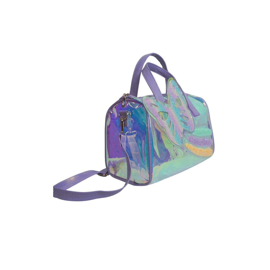 Mango Muffins holographic duffel bag with a large glitter butterfly applique and rainbow trails. Features top handles and a shoulder strap.