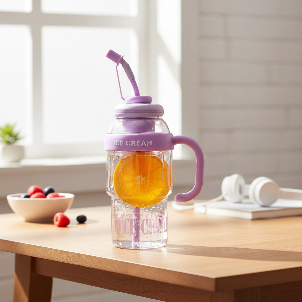 Mango Muffins Ice Cream Social Sipper tumbler with handle, straw, and orange slice. Purple and clear.