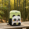 Mango Muffins light green backpack with a white panda face, black ears, and yellow star details. Features adjustable straps.