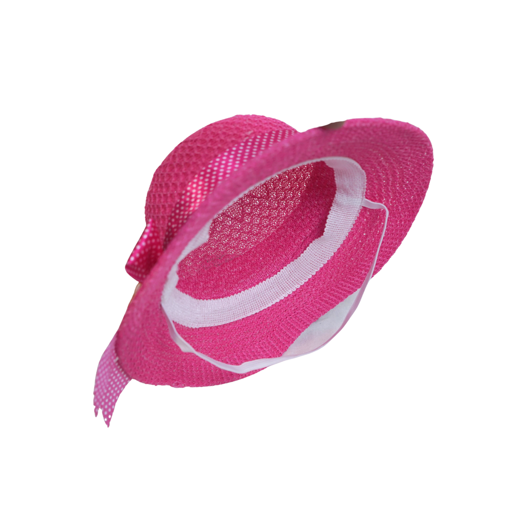 Mango Muffins pink woven cloche hat with polka dot band and fabric flower accent.