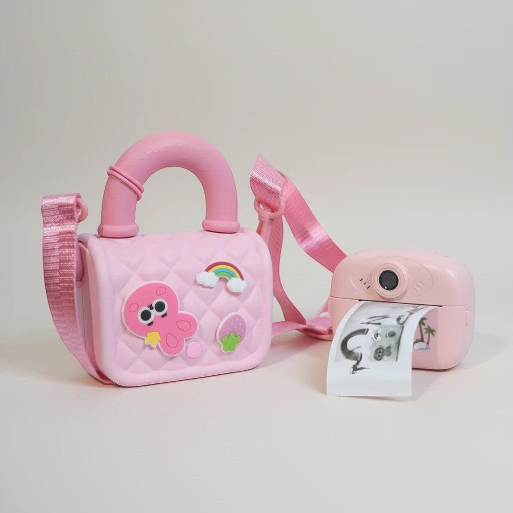 Mango Muffins pastel pink quilted purse with charms and matching instant print camera.