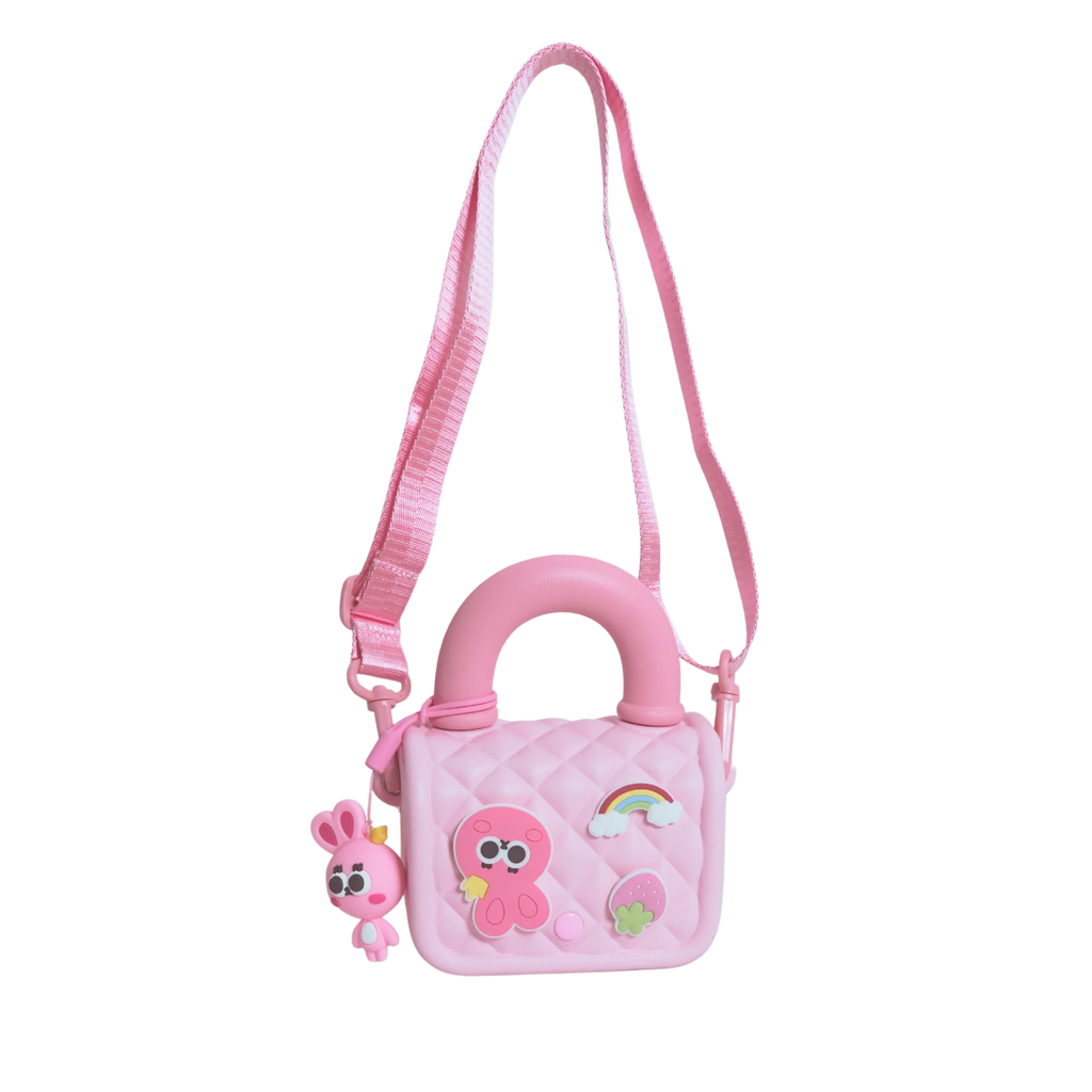Mango Muffins pink quilted sling bag with cute cartoon patches and a bunny charm. Adjustable strap.