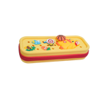 Yellow pencil case with red zipper, featuring cartoon designs like a carrot, lollipop, and basketball. Mango Muffins.